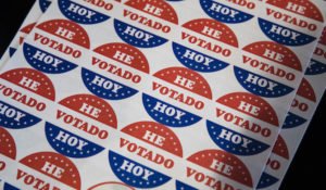 Shown in the Spanish language are "He Votado Hoy" stickers or "I voted today" at a polling place in Philadelphia, Tuesday, May 21, 2019. (AP Photo/Matt Rourke)